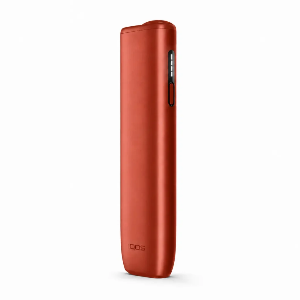 ILUMA i ONE — Terracotta heated tobacco device on white background