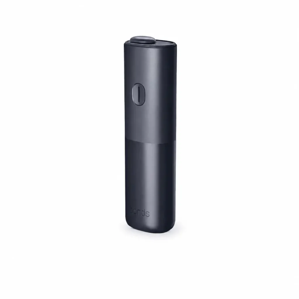 IQOS BONDS Cosmic Black heated tobacco device on white background